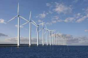 Enormous windmills standing in the sea